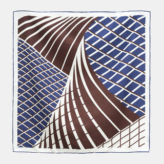 Luxury silk square scarf featuring navy and brown Kanagawa wave design with geometric grid pattern and hand-rolled navy border