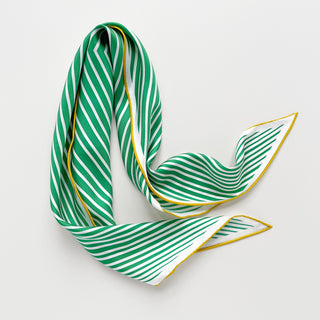 Triangle silk scarf with green and white diagonal stripes pattern, featuring elegant yellow hand-rolled edges, displayed on white background