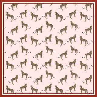 Pink silk scarf with repeating leopard pattern, bordered by a thin red frame. Square design with hand-rolled edges for elegant styling.