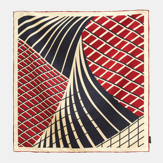 Square silk scarf featuring modern Kanagawa wave design with navy blue wave patterns against red geometric backgrounds, bordered by cream trim with hand-rolled edges