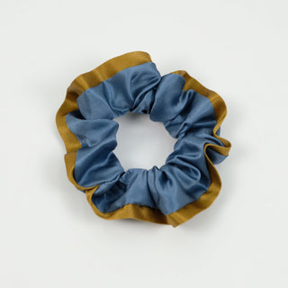 Luxurious silk scrunchie in Egyptian blue with copper trim, featuring a ruffled design against white background. Part of handmade set.