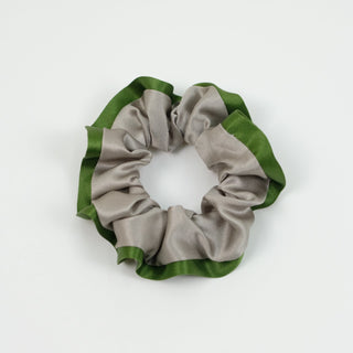 Luxurious silk scrunchie with khaki center and grass green edges, showcasing ruffle texture on white background, part of handmade set