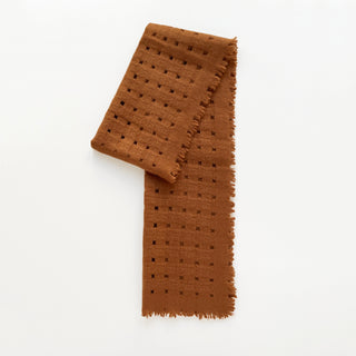 Burnt mustard pure cashmere scarf featuring openwork jacquard design.