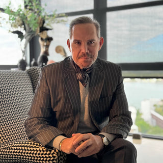 men’s dark grey paisley silk scarf styled with tailored suit, square neck scarf worn under blazer by LuluLane