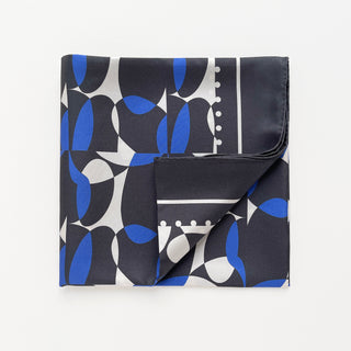 Folded women’s silk scarf 90cm in pebble-inspired print, English seaside tones, large square with hand-rolled hems by LuluLane.