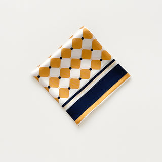 Folded unisex silk scarf 65cm in chess board pattern, golden squash yellow and navy, double-sided print, hand-rolled hems by LuluLane.