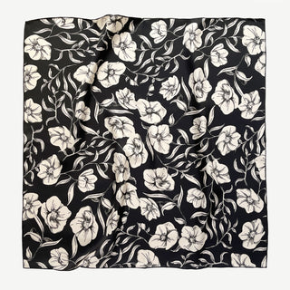 Women’s 65cm silk square scarf with off white poppy blossom floral print in black background, double-sided silk twill and hand-rolled hems by LuluLane
