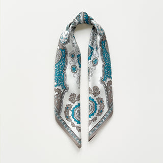 Elegant silk scarf with vintage baroque pattern in turquoise blue and taupe on cream background, featuring ornate medallions and decorative border