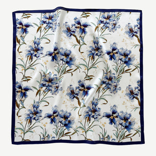 women's silk scarf with blue bell floral pattern on white background, bordered with navy blue edges
