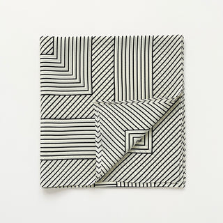 Women’s black and white geometric silk scarf in 90x90cm square design with subtle LOVE lettering and minimalist stripe pattern