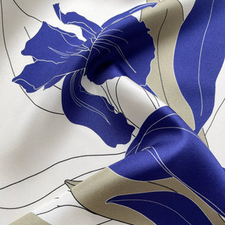 Women’s blue iris silk scarf in 65cm square size, floral silk twill scarf with double-sided print and hand-rolled edges