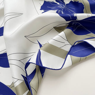 Women’s blue iris silk scarf in 65cm square size, floral silk twill scarf with double-sided print and hand-rolled edges