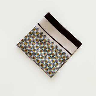 men's silk neckerchief with heritage geometric print in ivory, blue and brown, 65cm square scarf