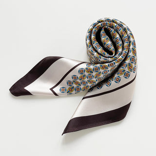 men's silk neckerchief with heritage geometric print in ivory, blue and brown, 65cm square scarf