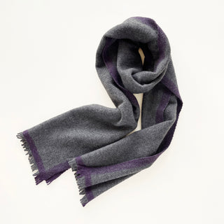 Heather grey and purple unisex cashmere scarf arranged to show its long, softly draped shape.