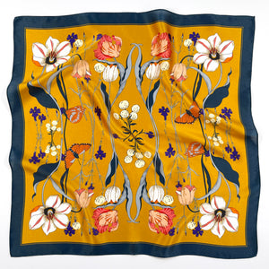 vintage vibe silk bandana scarf in vibrant mustard yellow featuring flowers and butterflies print with dark blue edge