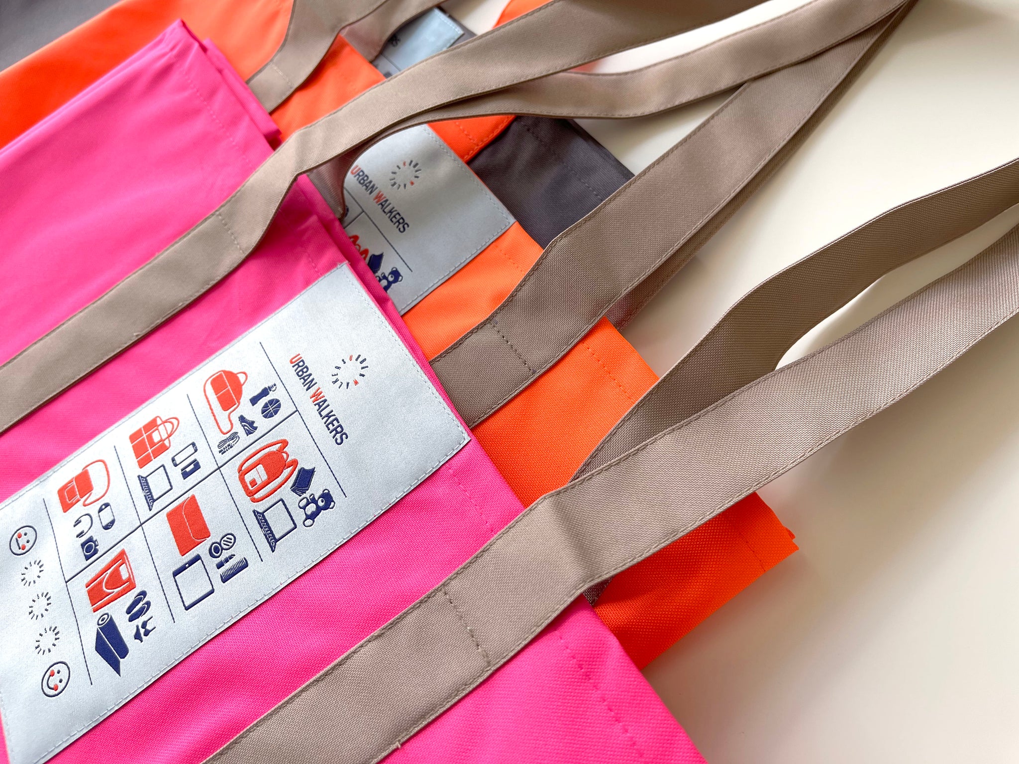 recycled bright tote bags/beach bags in neon pink and neon orange