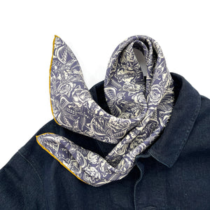 a vintage rose print blue silk scarf/neckerchief with mustard yellow hand rolled hems paring with a navy blue denim jacket