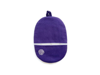 Deep purple linen oven mitt with white piping, decorative circular embroidery detail, and hanging loop on white background