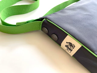 a navy blue recycled crossbody bag